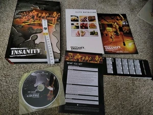 Beachbody Insanity Workout DVD Set Complete with 13 Discs And Equipment - Picture 1 of 3