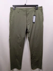 RHONE Mens COMMUTER PANTS Size 34 Actual:34 x 27 Olive Green FLEX-KNIT NWT - Picture 1 of 13