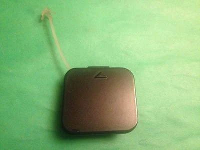 Parachoques trasero BMW 740i 2000 ojo de remolque OEM negro 51118125312 Foto 1 de 4