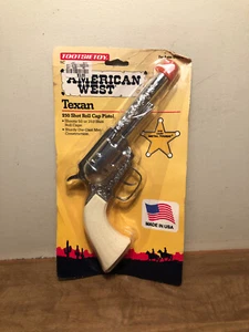 Tootsietoy American West Texan 50/250 Shot Roll Cap Pistol Die Cast Vintage New. - Picture 1 of 2