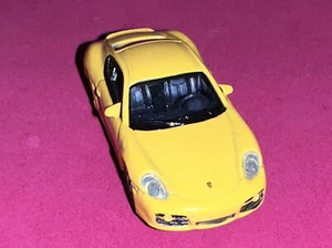 HO Scale Porsche Cayman S • Yellow • Welly • Realistically Detailed • 1:87 - Picture 1 of 23
