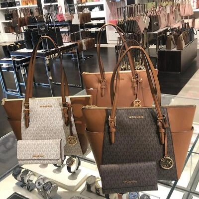 Michael Kors Charlotte PVC or Leather Top Handbag Shoulder Bag +Trifold Wallet - Image 1 of 4