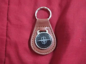 1960's 1970's LINCOLN CONTINENTAL MARK TOWN CAR LOGO KEYCHAIN NEW BROWN - Picture 1 of 2