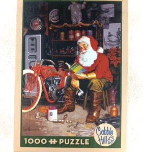 Santa's Flying Merkel Christmas Bike 1000 Piece Jigsaw Puzzle Tom Newsom - Picture 1 of 4