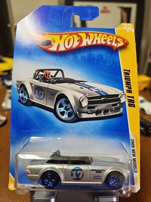 🏁Hot Wheels TRIUMPH TR6 -'2009 New Models' with blue wheels. - Image 1 of 3