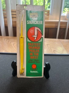 DE COLECCIÓN NUEVO STOCK ANTIGUO SUNKIST "THE SNACKER" PELADOR DE NARANJA MÁS RÁPIDO EN EL OESTE - Imagen 1 de 4
