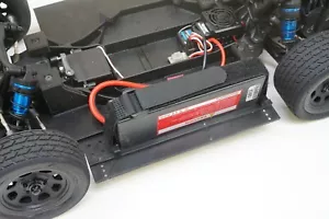 Bandeja de batería montada a la izquierda Team Associated SR10 actualización/ovalado de suciedad sesgo de giro a la izquierda - Imagen 1 de 4