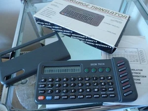 6 Sprachübersetzer mit Uhr/Kalender/Rechner etc. - Originalkarton & Handbuch - Bild 1 von 6