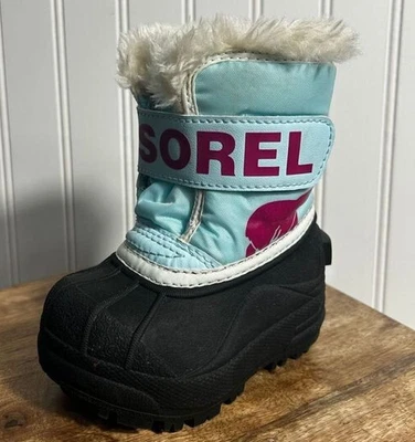 BOTA DE NIEVE SOREL SNOW COMMANDER PARA NIÑOS - Ocean Surf/Rosa Cactus - TALLA 4 NIÑO PEQUEÑO Foto 1 de 4