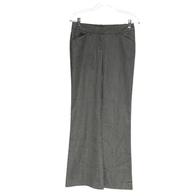 Pantalones bootcut a lunares grises BEBE - talla 0P Foto 1 de 4