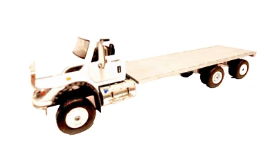 Greenlight / DCP  White International Cutom Built 27 Ft Flatbed - Hay - Salvage - Image 1 of 4
