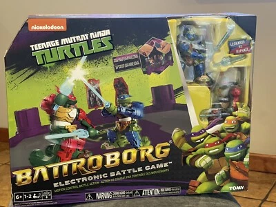 Año 2014 TMNT BATTROBORG Juego de Batalla Electrónico con Leonardo VS Raphael 🔥 Foto 1 de 4