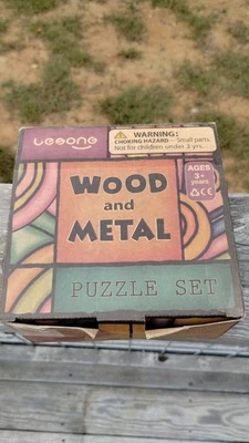 Lesong Wood and Metal Brain Teaser Puzzle Set - Image 1 of 4