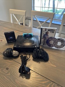 Sega Saturn Model 2 w/ Saroo + 128GB SD + Scart, 2 controllers & 3 Games!