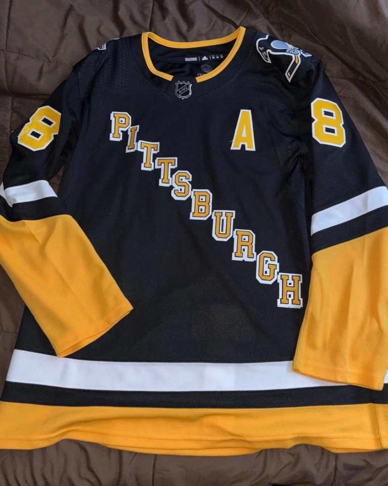 Camiseta deportiva de hockey para hombre Adidas NHL Pittsburgh Penguins Kris Letang grande Foto 1 de 4