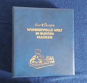 Disney, Briefmarken, Album mit ca. 475 Marken auf 75 Seiten inkl. Münze - Bild 1 von 8