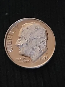 Very rare Error 1994  dime  double stamp face   Discolor  10 cent - Picture 1 of 17