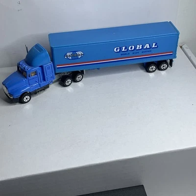 ROAD CHAMPS Global Moving Tractor Trailer Truck Semi 1:64 Scale. No Box KENWORTH - Image 1 of 4