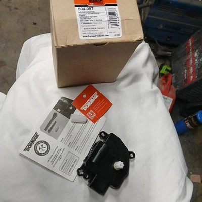 604-057 Dorman HVAC calentador mezcla puerta actuador lado conductor o pasajero para Jeep Foto 1 de 4