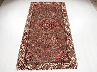 Excelente alfombra tribal vintage anudada a mano de 10' 1" x 5' Foto 1 de 4