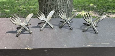 Pier 1 Imports Tenedor/Cuchillo Servilleteros, Juego de 4 Plateados Foto 1 de 4