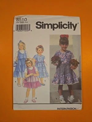 SIMPLICITY PATTERN   8510 CHILDS' DRESS, JUMPER - BOTH TWO LENGTHS & PURSE - Image 1 of 4