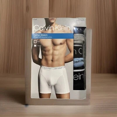 Paquete de 3 calzoncillos boxer Calvin Klein para hombre talla grande gris negro azul algodón elástico Foto 1 de 4