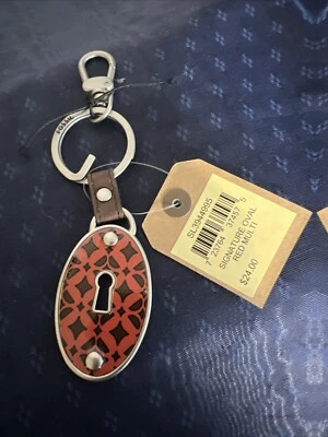 Chaveiro múltiplo vermelho oval assinatura fóssil presente perfeito  - Imagem 1 de 4