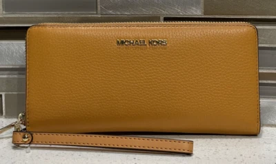 MICHAEL KORS JET SET GRANDE VIAJE CONTINENTAL MK CREMALLERA CARTERA SIDRA ORO AMARILLO Foto 1 de 4