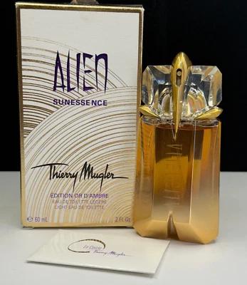 Perfume Leñoso Alien Sunessence Thierry Mugler Edition o D'Ambre EDT 2 OZ *Verificar Foto 1 de 4