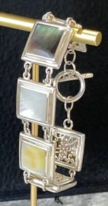 Vintage NF Sterling Reversible Lustre Abalone Filigran Knebelarmband 34,3 g - Bild 1 von 6