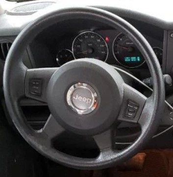 Jeep Commander LH 2007 bolsa de aire para rueda del conductor OEM Foto 1 de 4