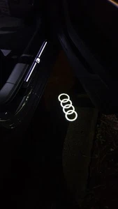 Luci sottoporta portiere LED Logo Audi A1 A3 A4 A6 Q3 ORIGINALE - Imagen 1 de 5