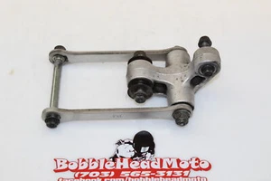 Suzuki Oem Rear Dogbone Shock Linkage Link 62600-35870 G9 - Picture 1 of 8