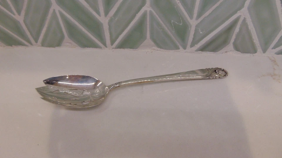 "Spring Glory" International Sterling Pierced Table Serving Spoon-60 grams-8.5" - Image 1 of 4