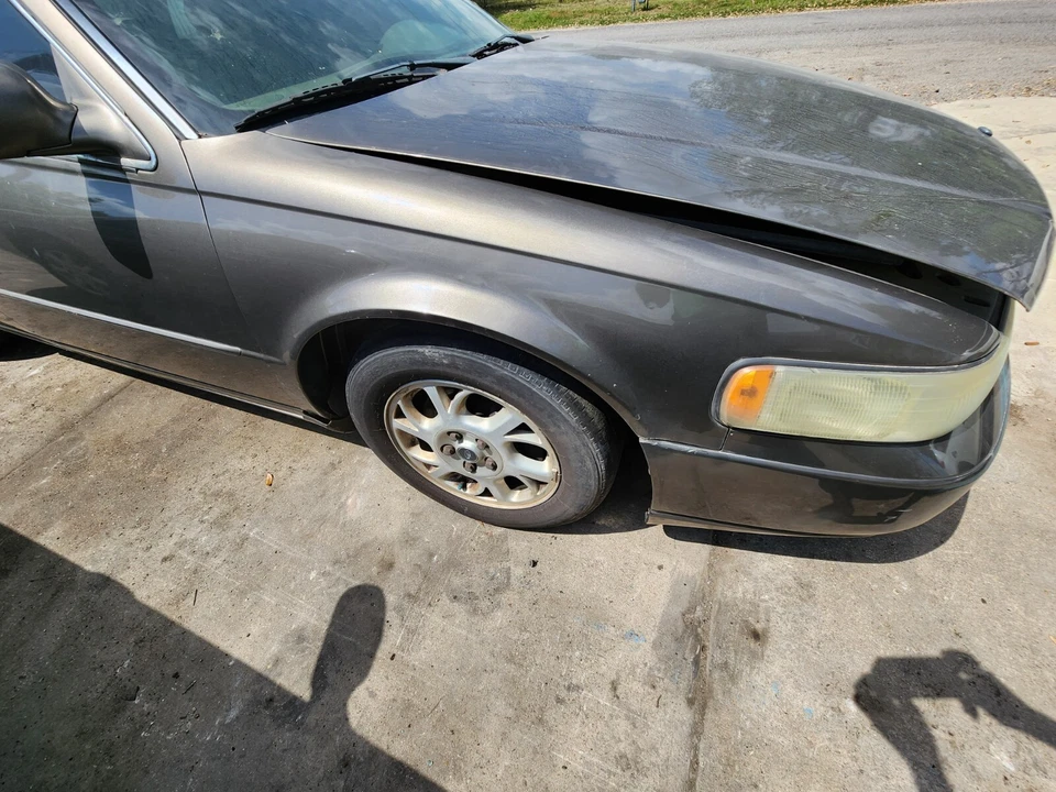 Cadillac Sevilla 1999 2000 2001 2002 2003 2004 guardabarros pasajero derecho gris #1 Foto 1 de 1