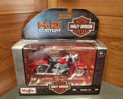 NUEVO EN CAJA RÉPLICA MAISTO 1958 FLH DUO GLIDE HARLEY-DAVIDSON® SERIE 30 1:18 Foto 1 de 4
