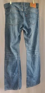 Levis 527 Men’s Bootcut Jeans 34x34 Low Rise Med Wash Blue Distressed Denim - Picture 1 of 14