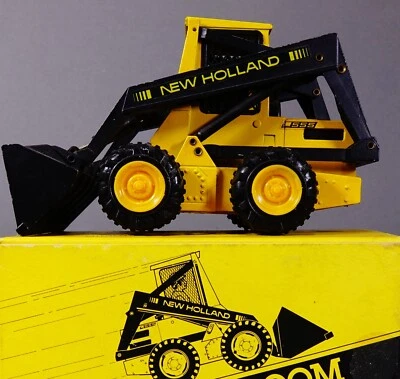 Cargador New Holland L-555 Super Boom NZG escala 1/25 Sperry Alemania Occidental Foto 1 de 4