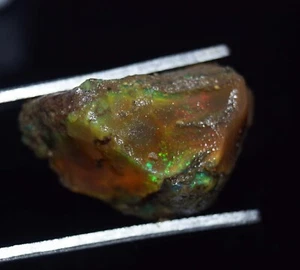 Piedra preciosa suelta áspera fuego ópalo negro etíope natural certificado 23,05 - Imagen 1 de 5