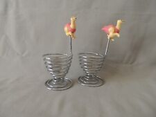 2 Metal egg holders spiral decorated