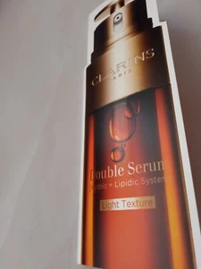 Clarins Paris Double Serum Light Texture Hydric + Lipidic System 0,9 ml Probe - Bild 1 von 3