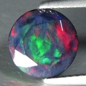 Piedra preciosa Etiopía redonda de ópalo negro multicolor brillante natural de 9 mm de 1,89 quilates - Imagen 1 de 4