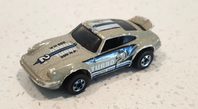 DE COLECCIÓN 1974 HOT WHEELS PORSCHE P 911 TURBO METÁLICO CREMA RARO Foto 1 de 4