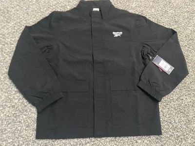 Chaqueta tejida de nailon utilitaria ligera para hombre Reebok - negra - mediana - ¡Nueva con etiquetas! Foto 1 de 4