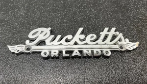 Vintage Puckett's Orlando Metal Badge Emblem - Picture 1 of 2