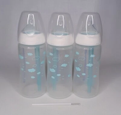 Lote de 3 biberones Nuk azul 10 oz. Foto 1 de 4