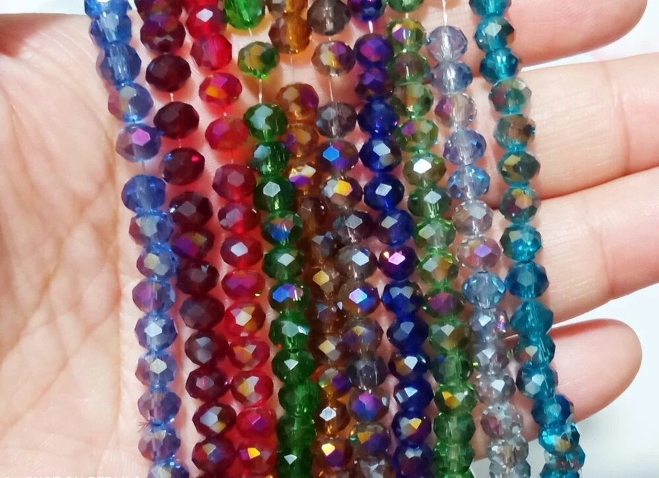 1filo/85pz perline in vetro cristallo colore trasparente AB forma cipolla 6x4mm - Immagine 1 di 2