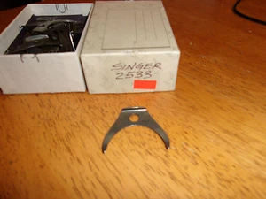 Singer 31-47 Part – 2533 Shuttle Race Back Spring - Picture 1 of 2