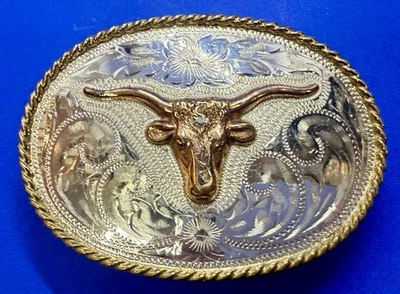 Cabeza de toro de vaca Longhorn ornamentada enchapada en plata hebilla de cinturón estampada senderos de puesta de sol Foto 1 de 4